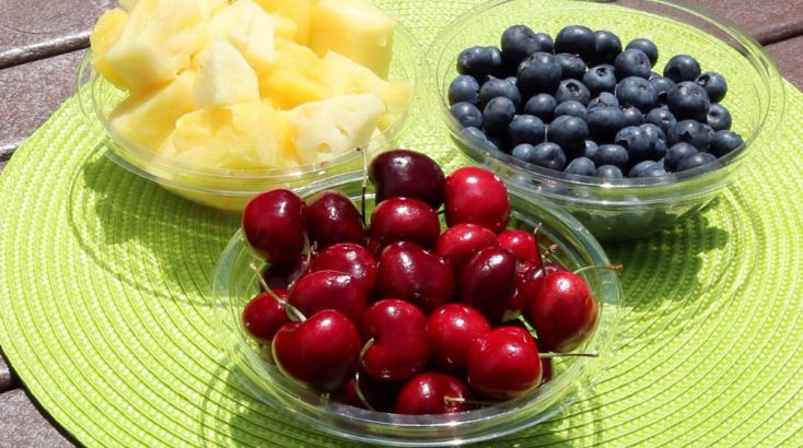 clear bowls filled with fruit